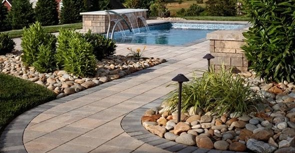 Natural Stone vs Concrete Pavers - A Comprehensive Comparison for Your Ultimate Backyard Oasis